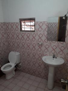Koupelna v ubytování Margosa Guesthouse