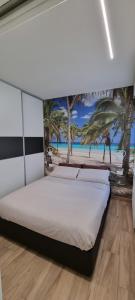 A bed or beds in a room at IO E TE bed and breakfast Appartamento