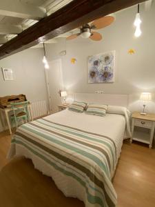 A bed or beds in a room at Agroturismo Ibarra