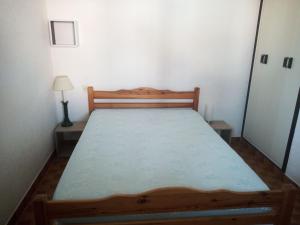 Posteľ alebo postele v izbe v ubytovaní 6 couchages, 100m plage, parking, clim, lave linge, lave vaisselle.....