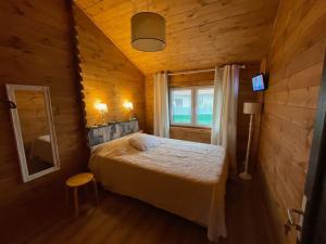 Postel nebo postele na pokoji v ubytování LA CABANE A INGALLS + 39 fotografií