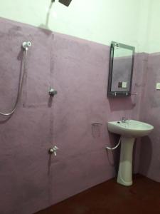 Koupelna v ubytování Margosa Guesthouse