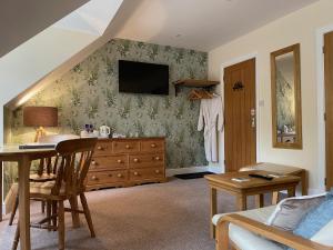 TV a/nebo společenská místnost v ubytování Lancasters Cottage + 21 fotografií
