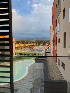 a view from the balcony of a building at Apartmán GOLD Akvamarín in Bešeňová