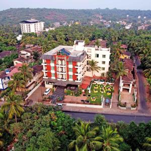 an aerial view of a building in a city at Godwin Goa in Candolim