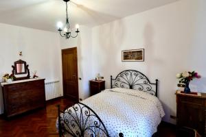 Posteľ alebo postele v izbe v ubytovaní Il Melograno - San Quirico d'Orcia