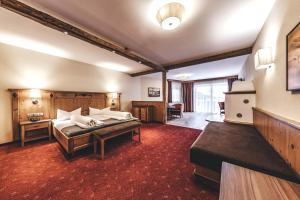 Voodi või voodid majutusasutuse Hotel Rose toas