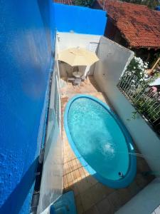an overhead view of a swimming pool on a house at Pousada Mar do Sonho Praia in Ipojuca