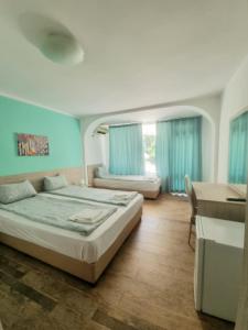 Postel nebo postele na pokoji v ubytování Hotel Char