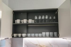 Příslušenství pro přípravu čaje a kávy v ubytování Palmyra Athens