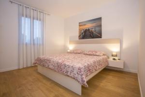 Posteľ alebo postele v izbe v ubytovaní Apartment Ivan 2