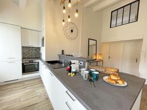 Afbeelding uit fotogalerij van L'appart' des Moussaillons in La Flotte