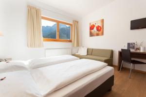 Voodi või voodid majutusasutuse Hotel Sole - Sonne toas