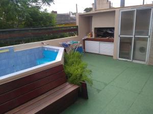 a backyard with a swimming pool on a house at Dpto Hipólito Yrigoyen in Concordia
