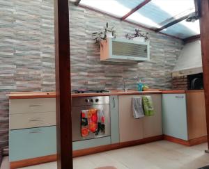 Kuchyňa alebo kuchynka v ubytovaní Villa Simona giardino & mare