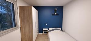 Posteľ alebo postele v izbe v ubytovaní Chambres avec douche privative dans appartement partagé - Metro - Wifi