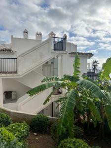 Vonkajšia záhrada v ubytovaní Apartment Sun of Andalucia in first beach line with view on Africa