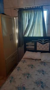 Ένα ή περισσότερα κρεβάτια σε δωμάτιο στο Pousada da Amália