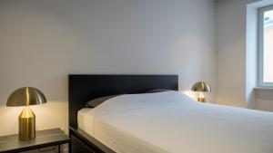 Łóżko lub łóżka w pokoju w obiekcie Luxury Apartment Contesa