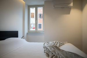 Łóżko lub łóżka w pokoju w obiekcie Luxury Apartment Contesa
