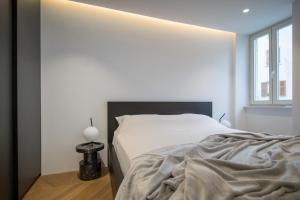 Łóżko lub łóżka w pokoju w obiekcie Luxury Apartment Contesa