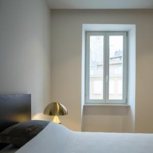 Łóżko lub łóżka w pokoju w obiekcie Luxury Apartment Contesa