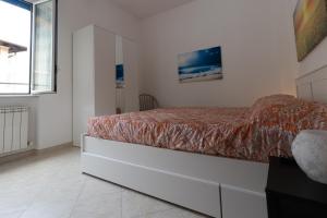 Postel nebo postele na pokoji v ubytování Casa Pietro e Bea