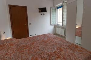 Postel nebo postele na pokoji v ubytování Casa Pietro e Bea