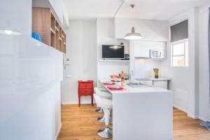 Kjøkken eller kjøkkenkrok på Modern and cozy Apartment