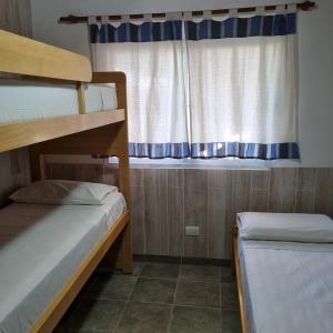 Bunk bed o mga bunk bed sa kuwarto sa Quinta Don Zenon