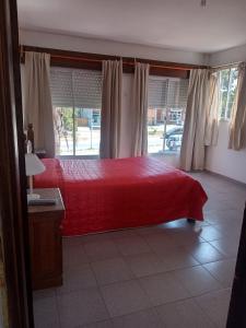 Postel nebo postele na pokoji v ubytování Departamentos Santiago