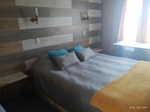 Ένα ή περισσότερα κρεβάτια σε δωμάτιο στο Hostal Klein