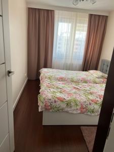 Posteľ alebo postele v izbe v ubytovaní Apartament 2 pokojowy Rzeszów