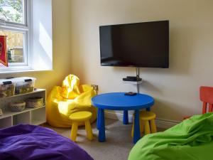 TV a/nebo společenská místnost v ubytování Chapel House