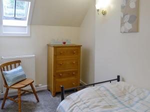 Кровать или кровати в номере Brae Cottage