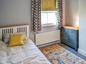 Katil atau katil-katil dalam bilik di Broads Rest