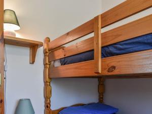 a couple of bunk beds in a room at Dairy Cottage - Uk37833 in Pillaton