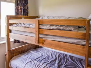two bunk beds in a room with a bed at Meadow Crest in Belton