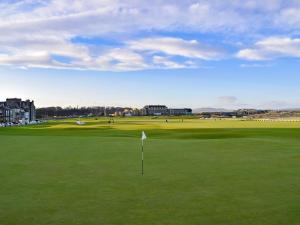 a view of a golf course with a green at Hollybank in Ladybank