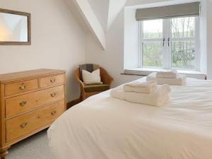 Postel nebo postele na pokoji v ubytování Smardale Cottage