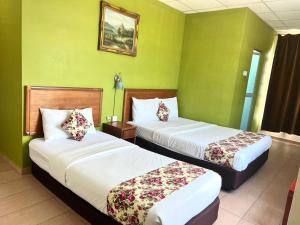 Katil atau katil-katil dalam bilik di HOTEL D VIEW MERSING
