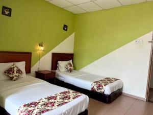 Katil atau katil-katil dalam bilik di HOTEL D VIEW MERSING