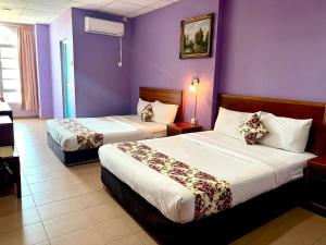 Postel nebo postele na pokoji v ubytování HOTEL D VIEW MERSING + 37 fotografií