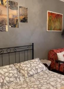 Postel nebo postele na pokoji v ubytování La casa di Ada