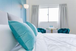 Een bed of bedden in een kamer bij 沙沙民宿