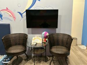 TV o dispositivi per l'intrattenimento presso 山田心溜滑梯民宿