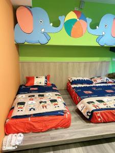 Letto o letti in una camera di 山田心溜滑梯民宿
