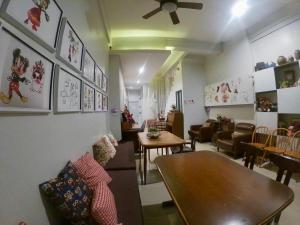 Posezení v ubytování Baan Nai Soi Mini Hotel