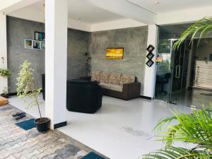 Istumisnurk majutusasutuses Eden Blue Hikkaduwa