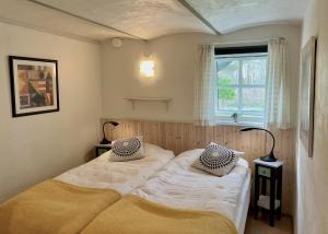 Postel nebo postele na pokoji v ubytování Skovboferie Apartments BB